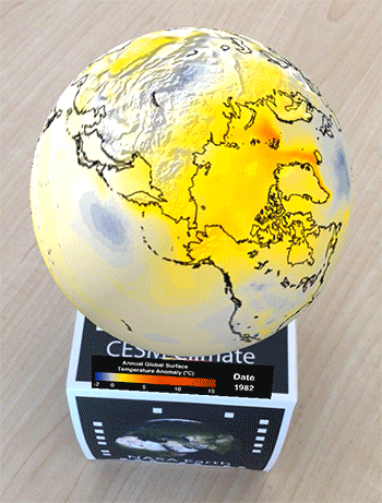 An animated globe displayed on a desk.
