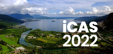 View of Lake Maggiore near Stresa, Italy, with an iCAS 2022 logo superimposed